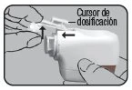 Two hands holding a white medical device with a black arrow indicating the dose slider and another arrow pointing to the left