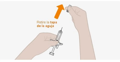 Two hands handling a syringe with a