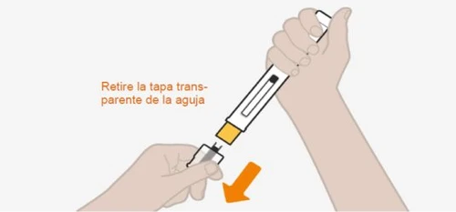 Two hands removing the transparent cap from the