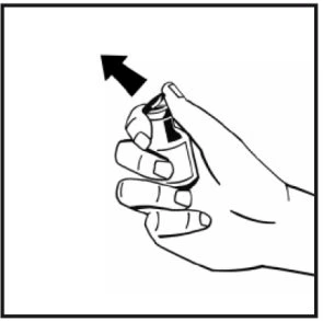 Una mano tiene un flacone spray con l'