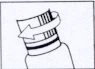 Schematic drawing of a bottle with a curved arrow indicating a leftward rotation to unscrew the cap