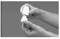 Two hands open a white pharmaceutical container by twisting the top to separate the cap from the vial body