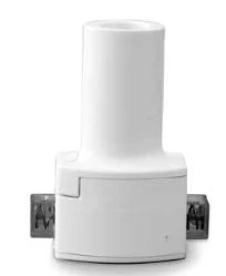 White medical device composed of a vertical cylinder on a square base with two small dark side connectors