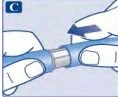 Two hands holding a blue and white cylindrical medical device with a blue arrow indicating a sliding movement to the left