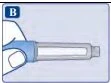 A hand horizontally holding a light blue and transparent cylindrical medical device with the letter B in a blue box at the top left