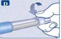A hand rotates the top part of an injection pen to the right, following the direction indicated by a blue curved arrow