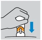 A hand presses downward on an orange and white medical device, indicated by a blue arrow pointing downward
