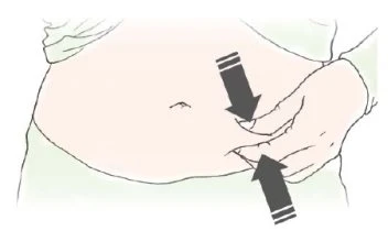 A hand pinching the skin of the