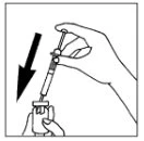 A hand holds a syringe with a needle and the tip is inserted into a glass vial held by the