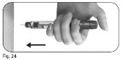 One hand holds a syringe horizontally with a black arrow indicating movement direction to the left