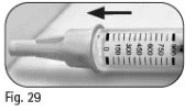 Graduated syringe with a numerical scale from 0 to 900 and a black arrow indicating movement direction to the left
