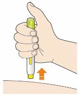A hand holding a green and white injector pen above the arm skin with an orange arrow pointing toward the