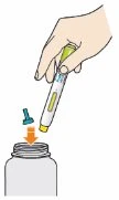 A hand holds a white and yellow injection pen above the neck of a gray vial with an orange arrow pointing downward