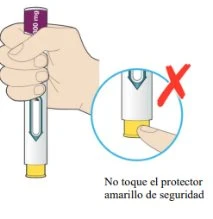 A hand holds a white cylindrical medical device with a yellow base section and a circle with a red X indicating not to touch the yellow protector