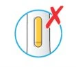 Circular diagram with an elongated yellow pill in a white container with a large red prohibition cross overlaid