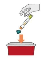 A hand holding a white and yellow container above a red container, with an orange arrow indicating disposal downward