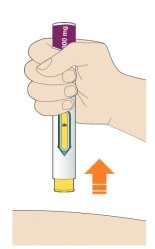 A hand holding a white and yellow injection pen above the arm skin with an orange arrow pointing downward