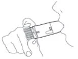Line drawing of a hand holding a cylindrical medical device and bringing it toward a person's mouth for administration