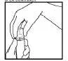 Black and white drawing showing two hands gripping and rotating a cylindrical medical device for