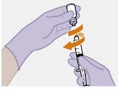 Purple-gloved hands unscrewing a vial from a syringe with orange arrows indicating a clockwise rotational movement
