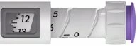 Detail of a medical device with a graduated scale numbered 12 and 13 visible in a rectangular window, and a white cylindrical body showing numbers 5 and 0