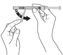 Two hands holding a syringe while a curved black arrow indicates rotational movement of the upper part of the device