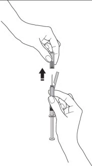 A hand placing a protective cap onto the tip of a needle-equipped syringe pointing toward the