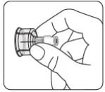 Una mano tiene saldamente un piccolo dispositivo medico cilindrico con base larga e connettore stretto verso l'