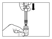 A hand holding a syringe and pushing it downward with a black arrow indicating insertion of the