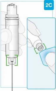 Illustrazione medica che mostra una mano che impugna un dispositivo iniettore bianco e un dettaglio dell