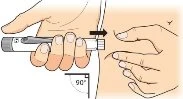 A hand holds an injection pen and presses it against the skin of the patient