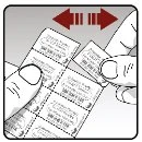 Two hands separating two strips of white tablets with text and barcodes, indicated by a double-pointed red arrow at the top