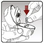 Hands inserting a small cylindrical vial into