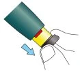 Illustration of a hand holding a yellow and green cylindrical medical device with a blue arrow indicating downward movement
