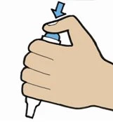 A hand holding a white medical device vertically, pressing the thumb on the upper part in the direction of a blue arrow