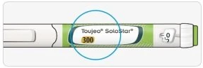 Close-up of a Toujeo SoloStar injection pen with a blue circle highlighting the concentration of 300 units on a white and green background