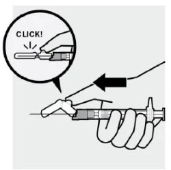 Disegno tecnico che mostra mani che impugnano una siringa con un ingrandimento circolare che evidenzia il suono di "click" durante l'iniezione