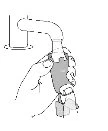 A hand holding a medical device with a curved tube connected to an upper cylindrical container and a square base