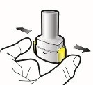 A hand holds a white medical device with yellow inserts while black arrows indicate lateral rotational movement