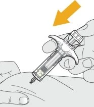 A hand holding an auto-injector ready to administer an injection