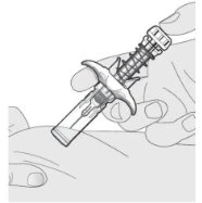 A hand holding an auto-injector with a wing-like device to inject medication into the fatty tissue of the thigh or arm