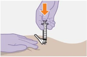 A gloved hand pressing downward a syringe with a needle being inserted into the skin of the thigh supported by the