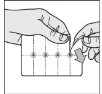 Two hands holding a rectangular container with four circular holes and an arrow indicating downward insertion movement