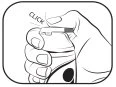 A hand gripping a medical device for the