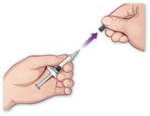 Two hands removing a black cap from the tip of a syringe, with a purple arrow indicating the direction of movement away from the syringe