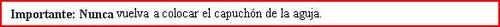 Bold text on a white background with a red border in Spanish reading: 'Important: Never reattach the needle cap'