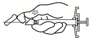 A hand holding a syringe with the