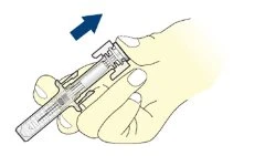 A hand holding a pre-filled syringe and rotating it upward
