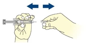 Two hands separating or joining a syringe barrel from a protective cap, indicated by two blue arrows pointing in opposite directions