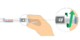 A hand holding a medical device with a green arrow indicating a movement toward the